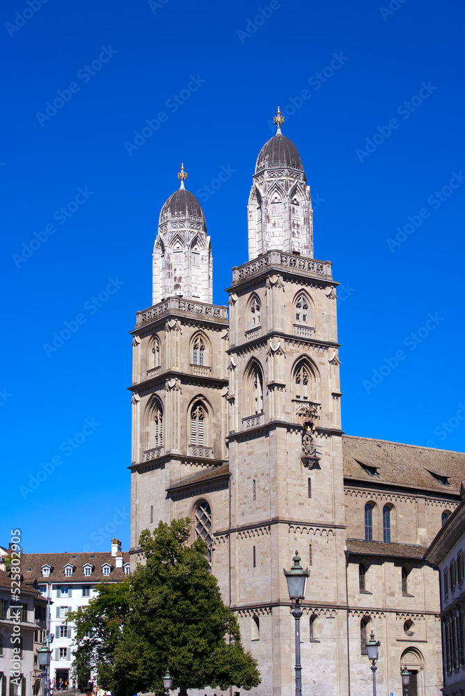 Protestant church Great Minster at the old town of Zürich at City of Zürich on a sunny summer day. Photo taken July 2nd, 2022, Zurich, Switzerland.