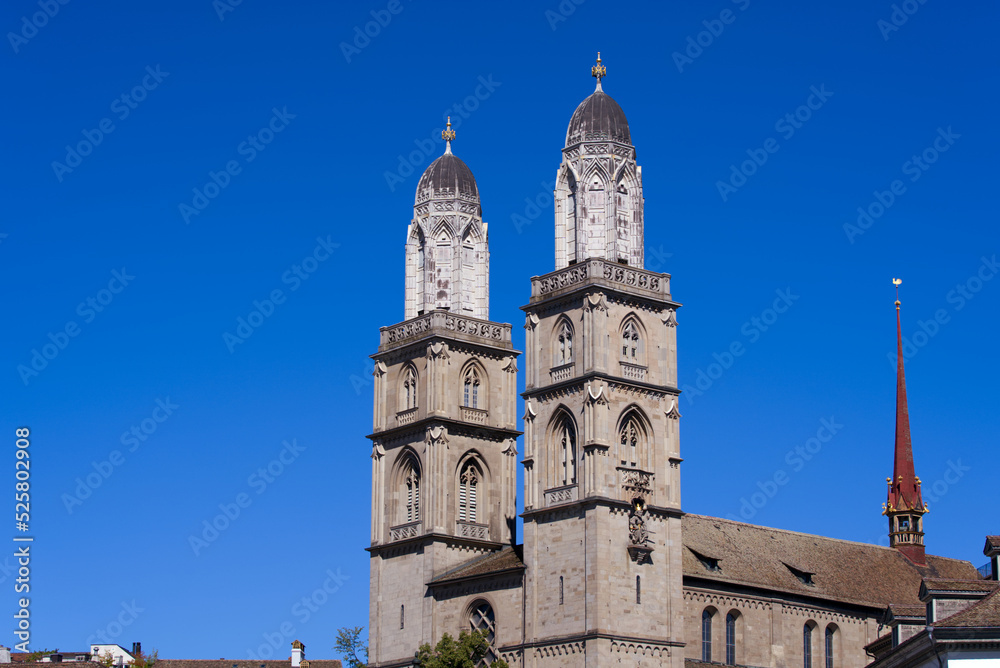 Protestant church Great Minster at the old town of Zürich at City of Zürich on a sunny summer day. Photo taken July 2nd, 2022, Zurich, Switzerland.