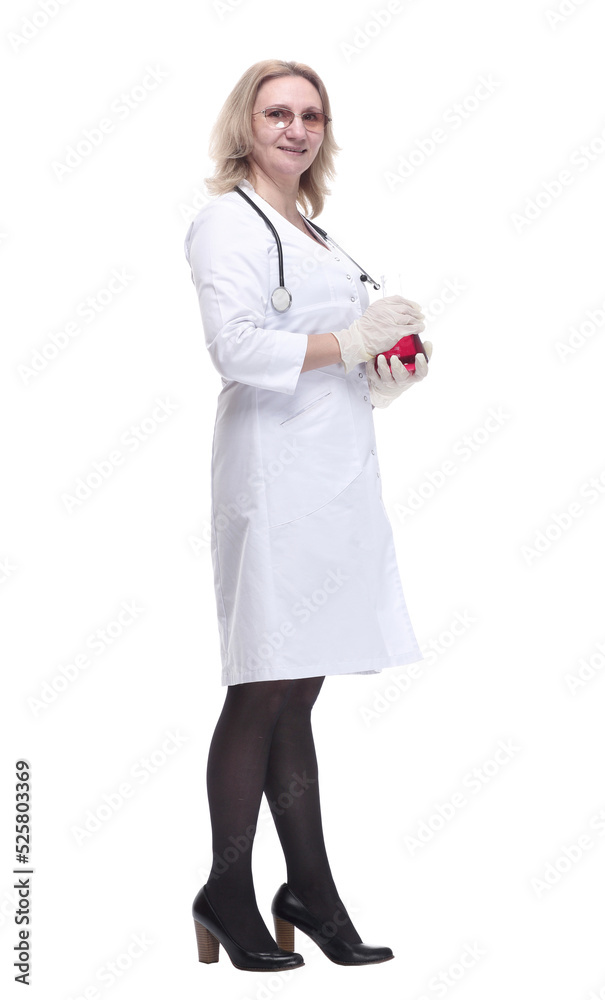 female doctor with a laboratory flask in her hands. female doctor with a laboratory flask in her hands.