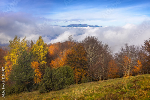 Beautiful Autumn Foggy Landscape ias seen from top of Puigsacalm Peak, Catalonia