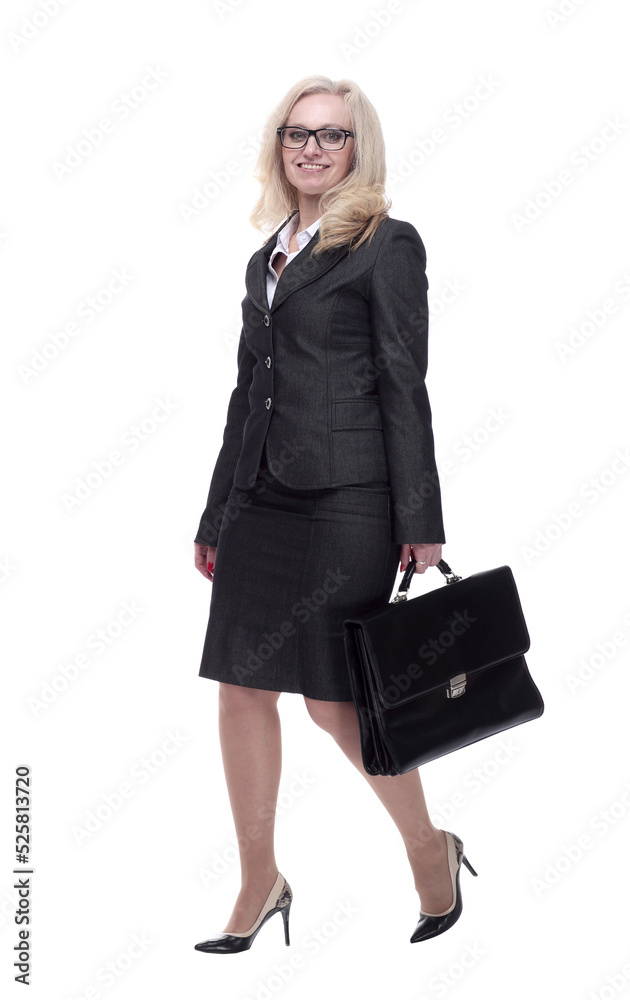 smiling business woman with a leather briefcase striding forward smiling business woman with a leather briefcase striding forward