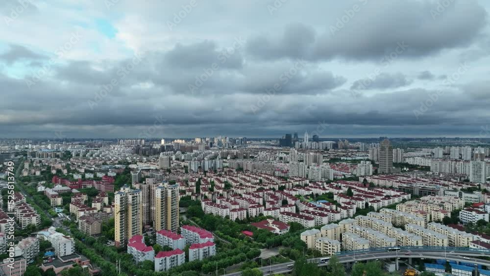 Cityscape of the residential area in the city. Drone aerial view. Flying over the residential community buildings in the downtown Shanghai. City scape, business, economy concept b-roll footage. Cityscape of the residential area in the city. Drone aerial view. Flying over the residential community buildings in the downtown Shanghai. City scape, business, economy concept b-roll footage.