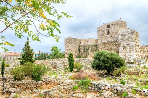 The crusaders' castle in the historic city of Byblos in Lebanon. A view of the western walls and a path leading to the east of the ancient site discovered in the area. © f8grapher