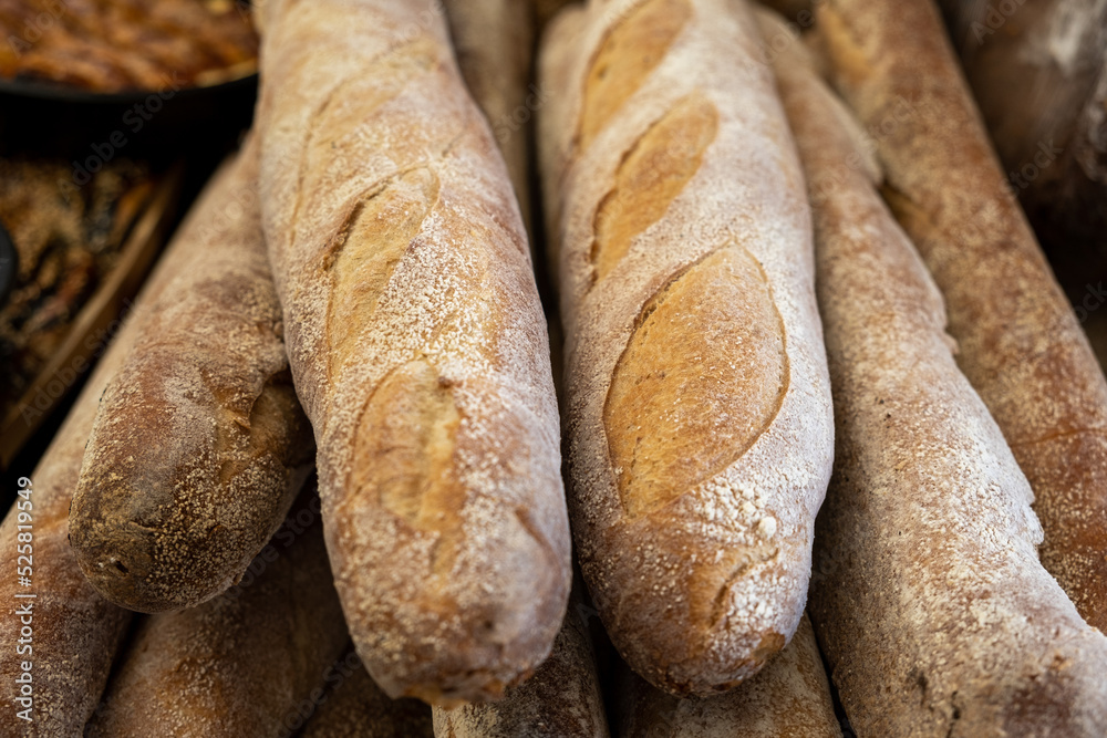 Fresh baked baguettes sold at the farmers market Fresh baked baguettes sold at the farmers market
