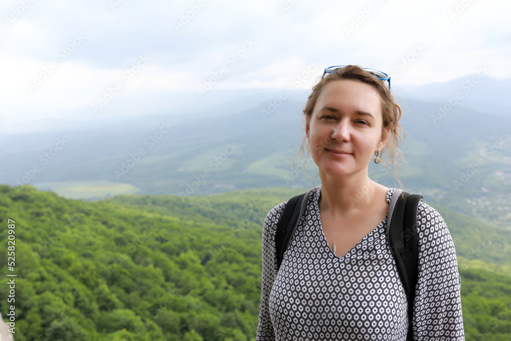 Woman posing on Una-koz ridge in Caucasus Woman posing on Una-koz ridge in Caucasus