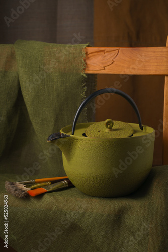 Still life with green teapot