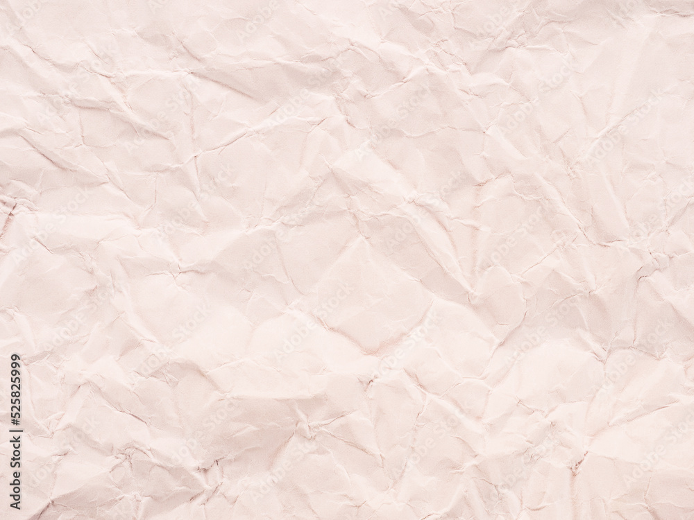 Сrumpled paper texture as an abstract background with warm tint Сrumpled paper texture as an abstract background with warm tint