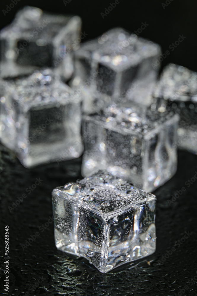 Multiple ice cubes on a Black background