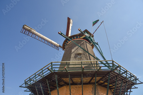Texel, Netherlands. August 2022. The authenic mill de traanroeier in Oudeschild on the island of texel.
