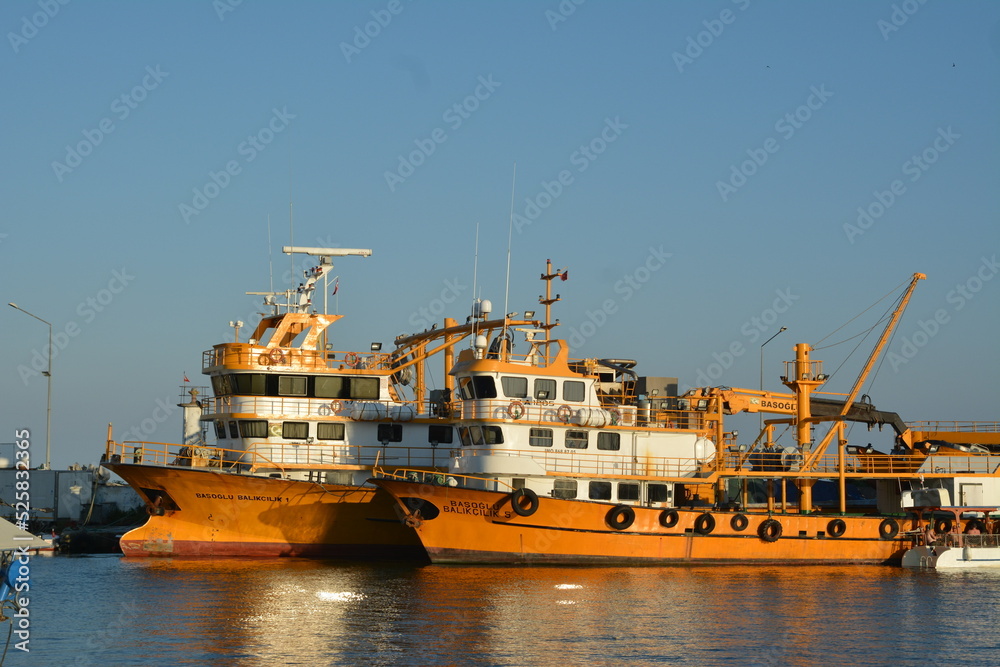 Two fishing vessel in the harbor 