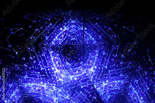 Blue kaleidoscope ornament. Carousel kaleidoscope. Bright neon pattern on a dark background. Horizontal blurry picture © jockermax3d