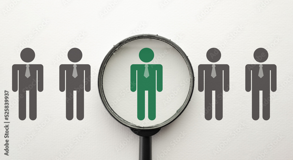 Human resources and management,Hierarchy,CRM,business concept.,View through a magnifying glass on green employee represented icon over white background.. Human resources and management,Hierarchy,CRM,business concept.,View through a magnifying glass on green employee represented icon over white background..