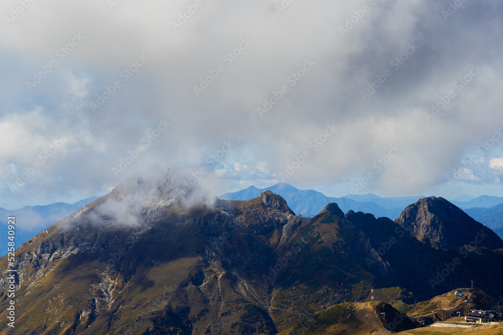 Brown autumn mountain peaks. Beautiful mountain landscape. freedom and beauty of nature. Autumn view of the Caucasus mountains in Russia Brown autumn mountain peaks. Beautiful mountain landscape. freedom and beauty of nature. Autumn view of the Caucasus mountains in Russia