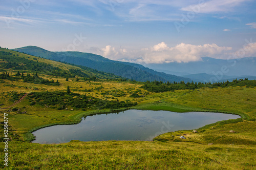 Beautiful mountain lake Apshinets on the Svidovets ridge in the Carpathian mountains of Ukraine