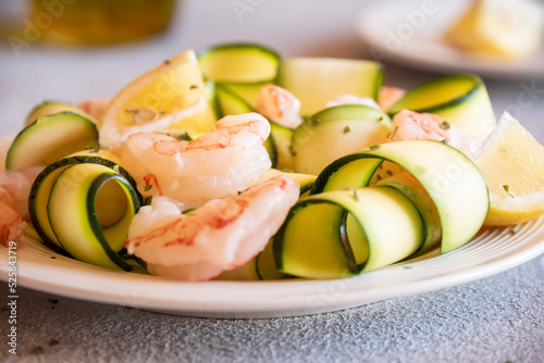 Fresh zucchini with shrimps, healthy and delicious food photo