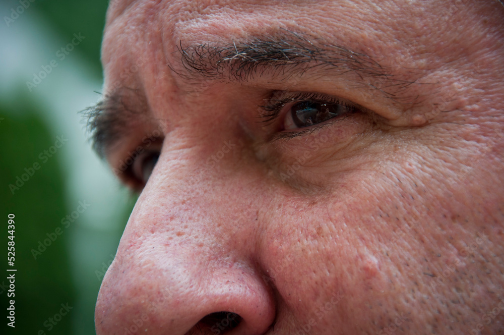 Fototapeta premium old man eyes looking. cropped view of face