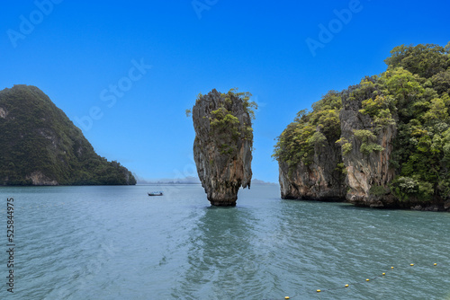 Island Phuket Thailand. Lovely rock in the middle of the ocean surrounded by mountains
