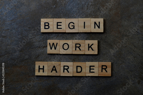begin work harder text on wooden square, business motivation quotes