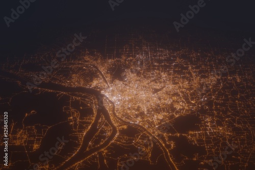 Aerial shot of Phnom Penh (Cambodia) at night, view from north. Imitation of satellite view on modern city with street lights and glow effect. 3d render