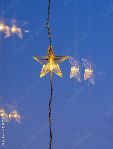 Closes up of LED light star chain, Christmas background