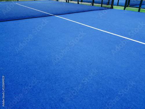 aerial view of a blue paddle tennis court, racket sports courts © Vic