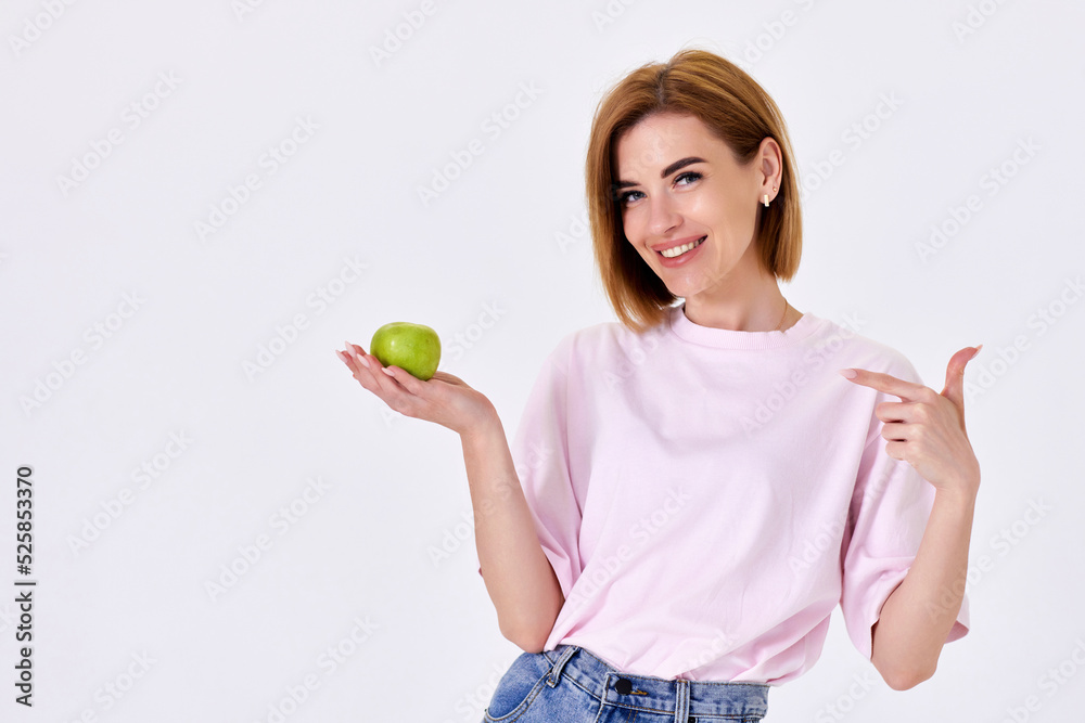 girl holding green apple isolated on white background girl holding green apple isolated on white background