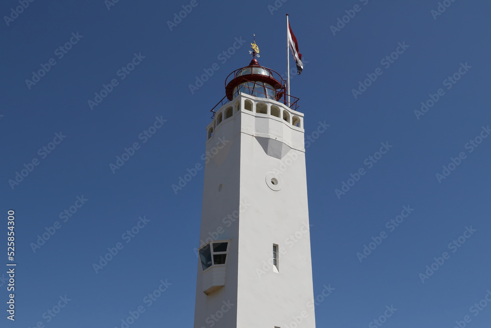 White lighthouse and blue sky