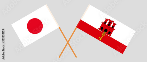 Crossed flags of Japan and Gibraltar. Official colors. Correct proportion