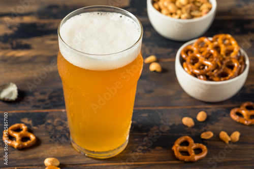 Cold Boozy Refreshing Oktoberfest Beer with Pretzels