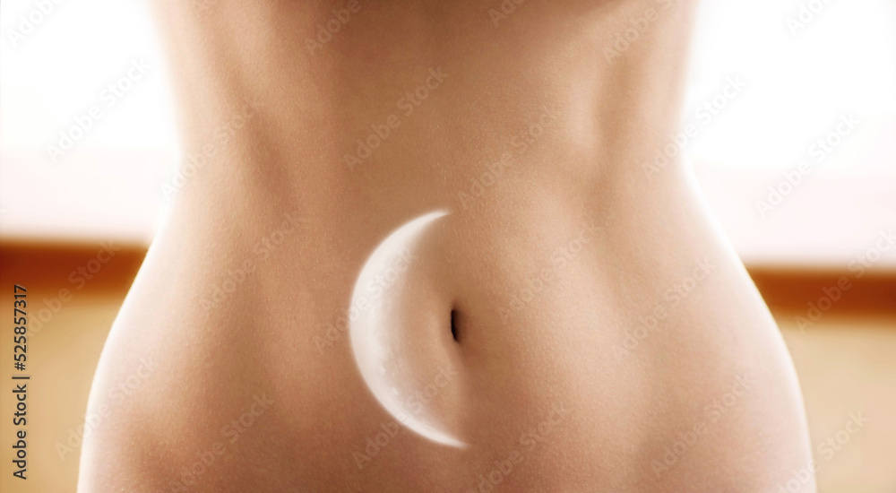 Female stomach with moon multiple exposure image. Menstruation and woman health concept. Female stomach with moon multiple exposure image. Menstruation and woman health concept.