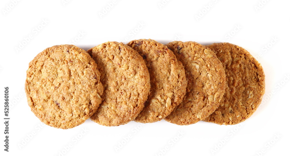 Round wholewheat biscuit with oat meal and pieces of fruit isolated on white, top view Round wholewheat biscuit with oat meal and pieces of fruit isolated on white, top view
