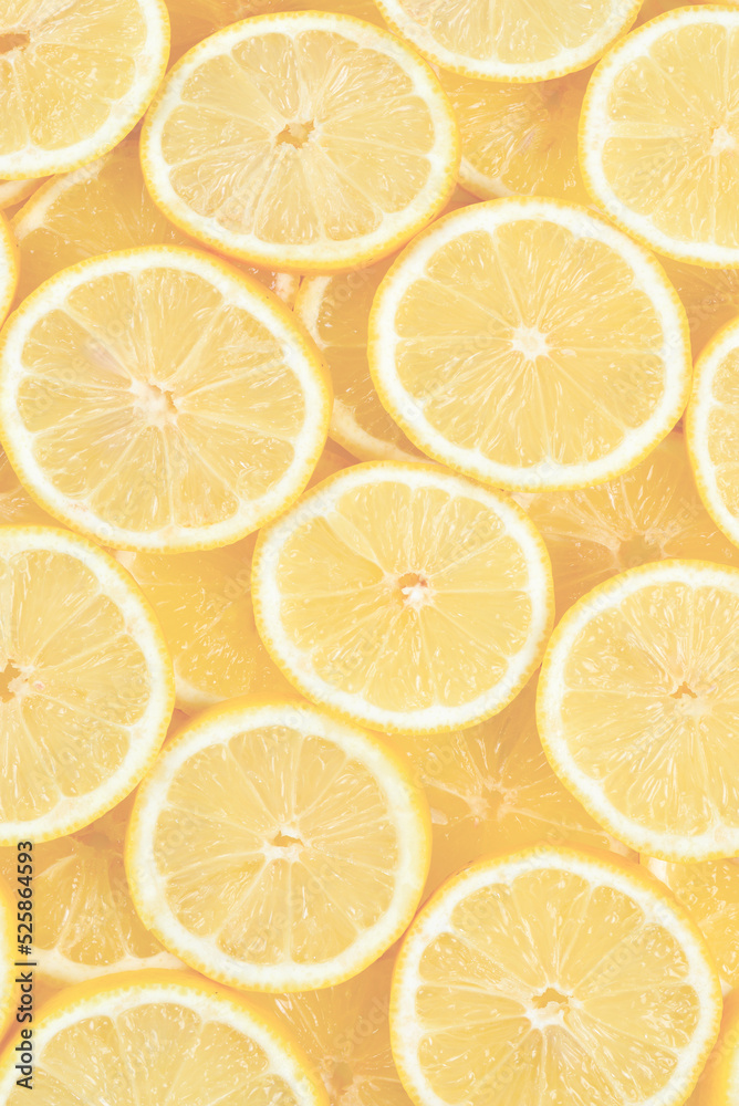 A slices of fresh juicy yellow lemons. Texture background, pattern. A slices of fresh juicy yellow lemons. Texture background, pattern.