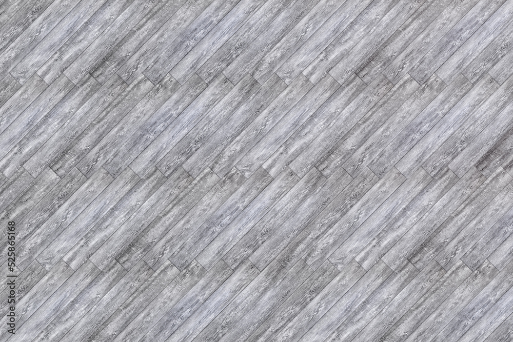Laminate background. Texture of natural wood. The flooring is made of gray boards and panels. The parquet is laid at an angle.
