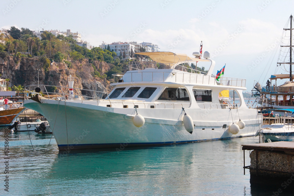white boats for navigation in the seaport of the Mediterranean sea
