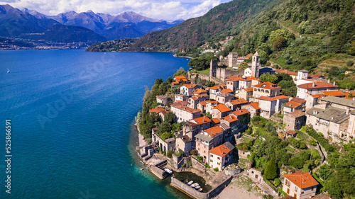Fototapeta Naklejka Na Ścianę i Meble -  Stynning idyllic lake scenery, amazing Lago di Como. Aerial view of beautiful medieval village Dervio. Italy travel
