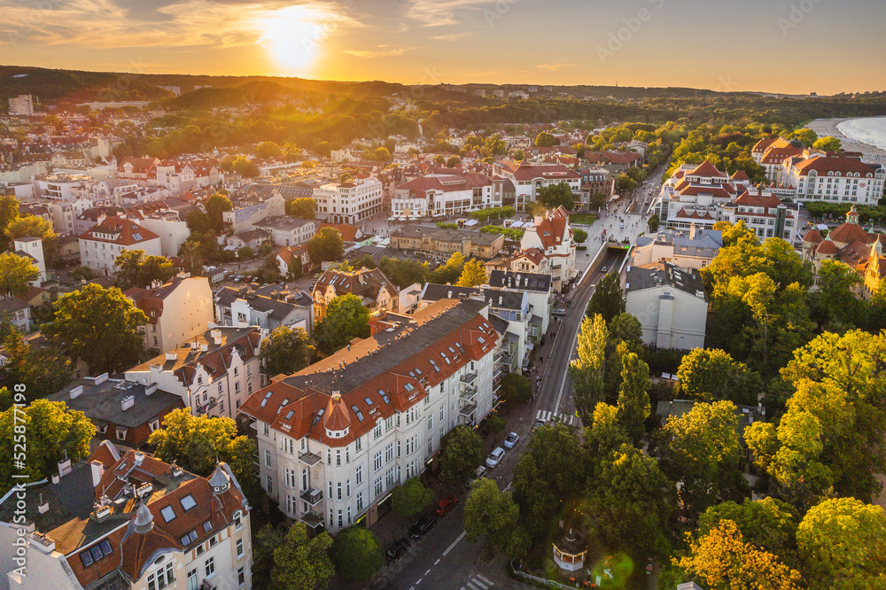 Aerial view of Sopot and the buildings of the seaside village. A warm summer afternoon creates a pleasant atmosphere in the photo. - obrazy, fototapety, plakaty 