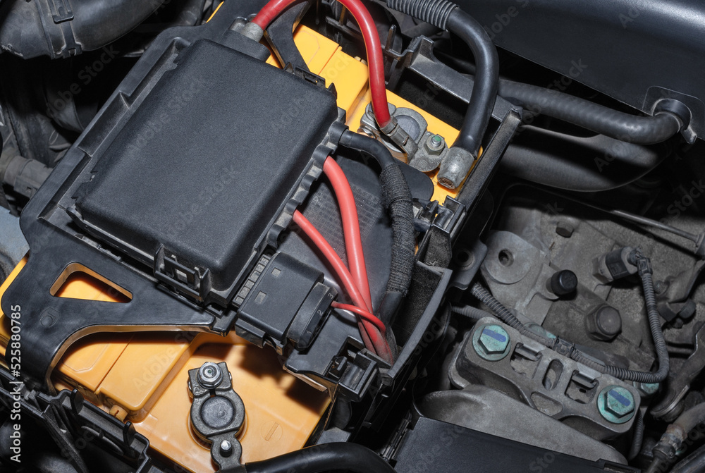 Car battery in the engine compartment