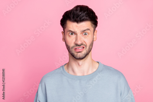 Photo of unsatisfied disgusted person make grimace look camera isolated on pink color background © deagreez