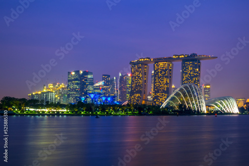 Singapore night view colorful buildings over water 