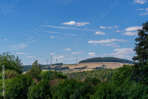 Landscape with wind power plant near the village Trendelburg