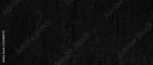 Abstract old and grainy dark slate blackboard or cardboard texture, Creative and old black wall or marble texture, dusty and high detailed black grunge texture, black background with vintage grunge.