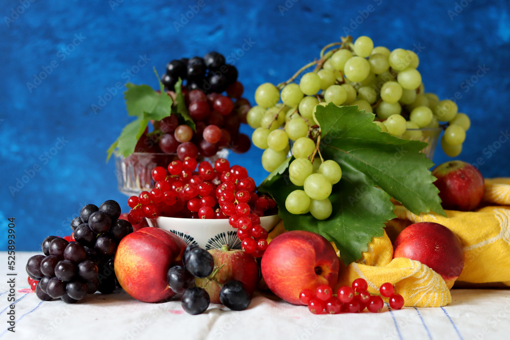 Fresh summer fruit and berry on a table. Natural antioxidants. Healthy eating concept. 