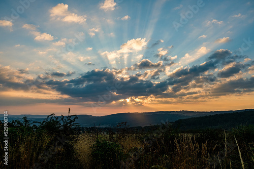 Sunrise over the mountain with strong sunshine light and cloudy near Frankfurt