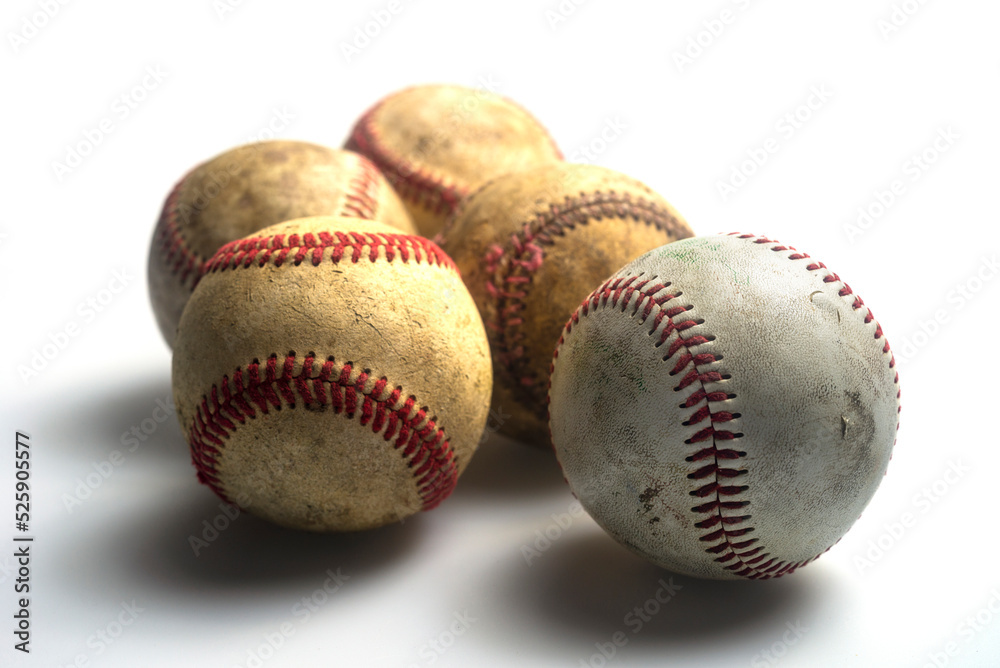 Close up old baseball isolated on a white background. Close up old baseball isolated on a white background.
