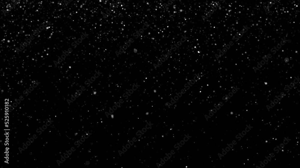 Abstract snowfall snowflakes looping motion on clean black background.