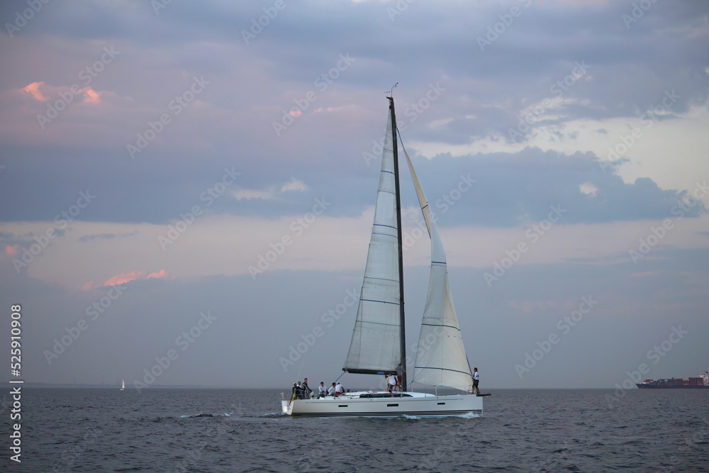 Sailing yacht regatta. Sailboats under sail in the race. Yachting. Luxury yachts.