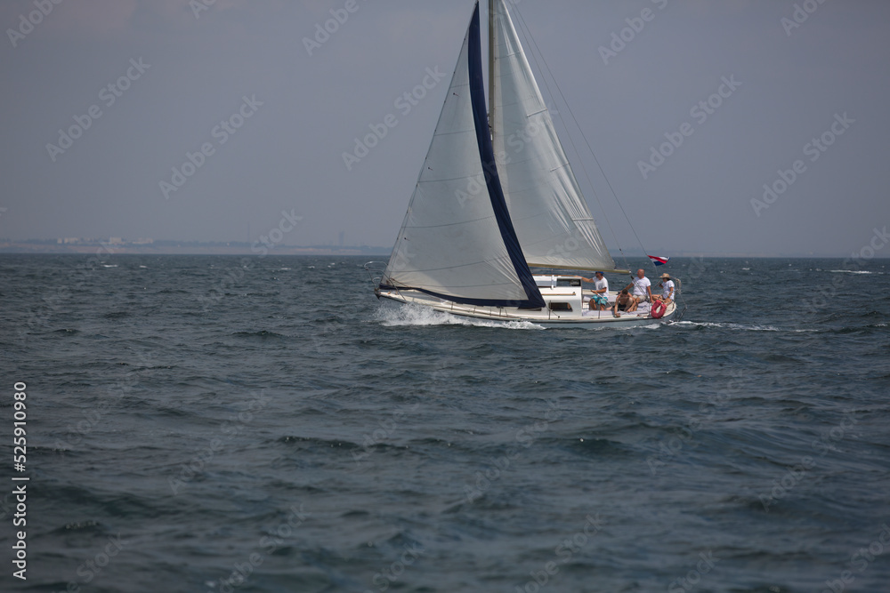 Fototapeta premium Sailing yacht regatta. Sailboats under sail in the race. Yachting. Luxury yachts.