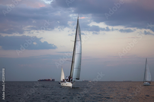 Sailing yacht regatta. Sailboats under sail in the race. Yachting. Luxury yachts. © Alexey Lesik