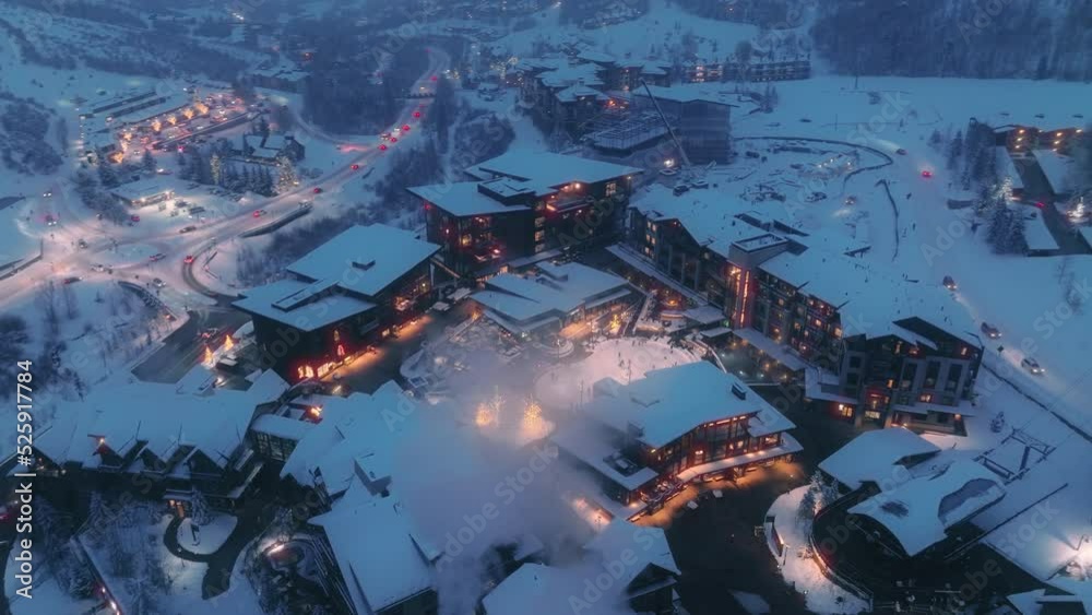 People having fun on Ice Skating Rink in Snowmass Ski Resort Village at