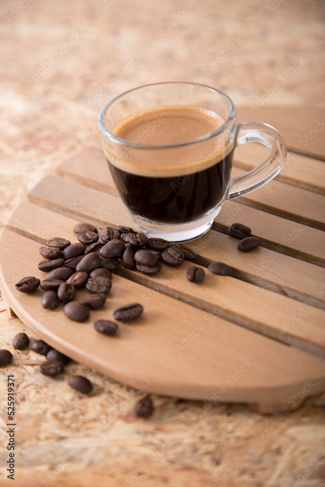 Small cup of coffee machine beans grains gourmet beverage waking up breakfast Small cup of coffee machine beans grains gourmet beverage waking up breakfast